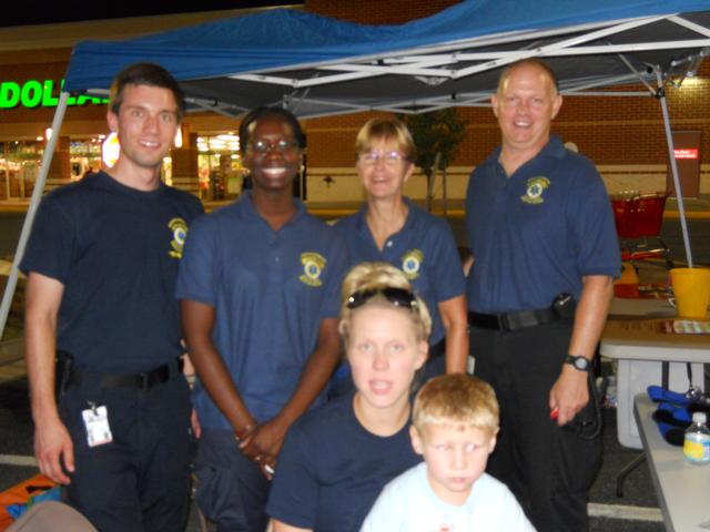ERic, Ashley, Jayne and Andrewstand bywhile Melissa sits with Jayden
NNO2011